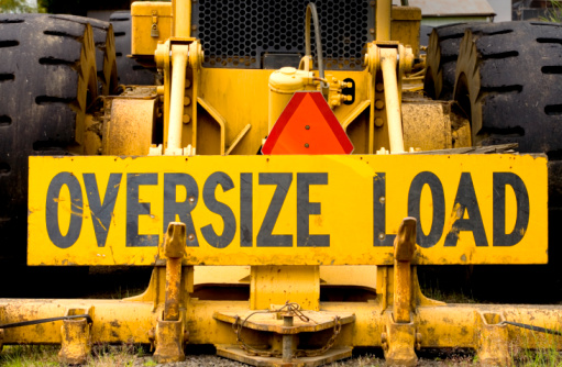 Photo of a sign for an "OVERSIZE LOAD."