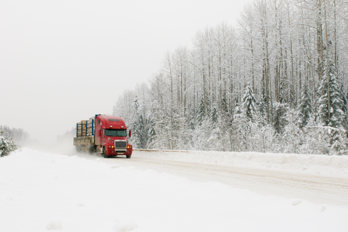 red truck on winter road